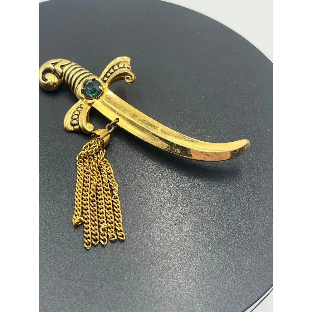 Coro Vintage Signed Gold‎ Tone Sword Dagger Brooch With Tassels and Green Stone